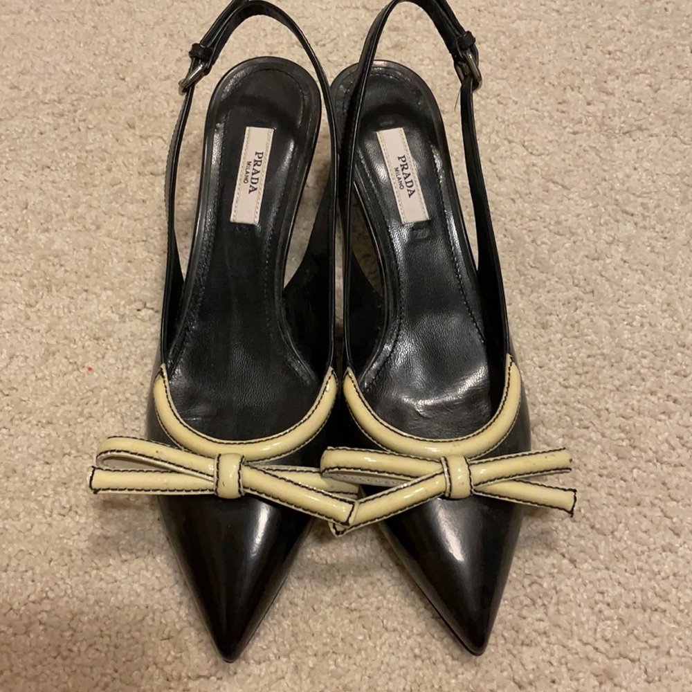 Prada 6.5 size black leather slingback.
